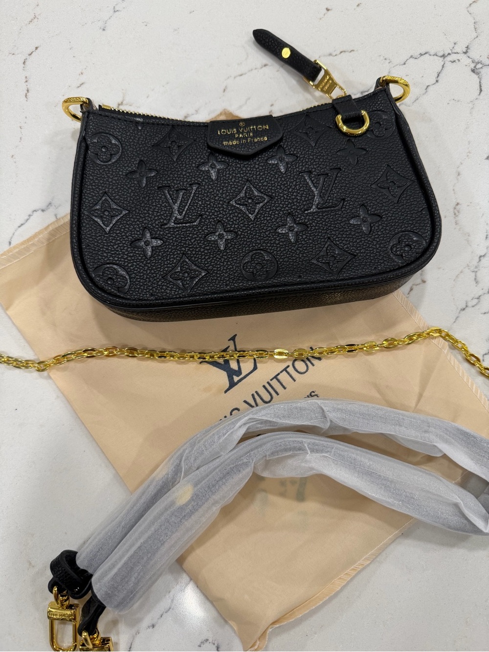 Louis Vuitton Black Empreinte Leather Mini Pochette with Gold Hardware